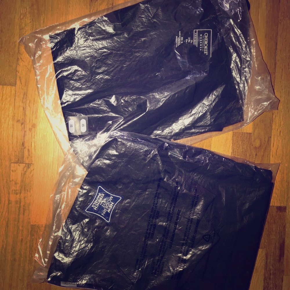 Brand new, in bag. Cherokee Workwear scrubs.